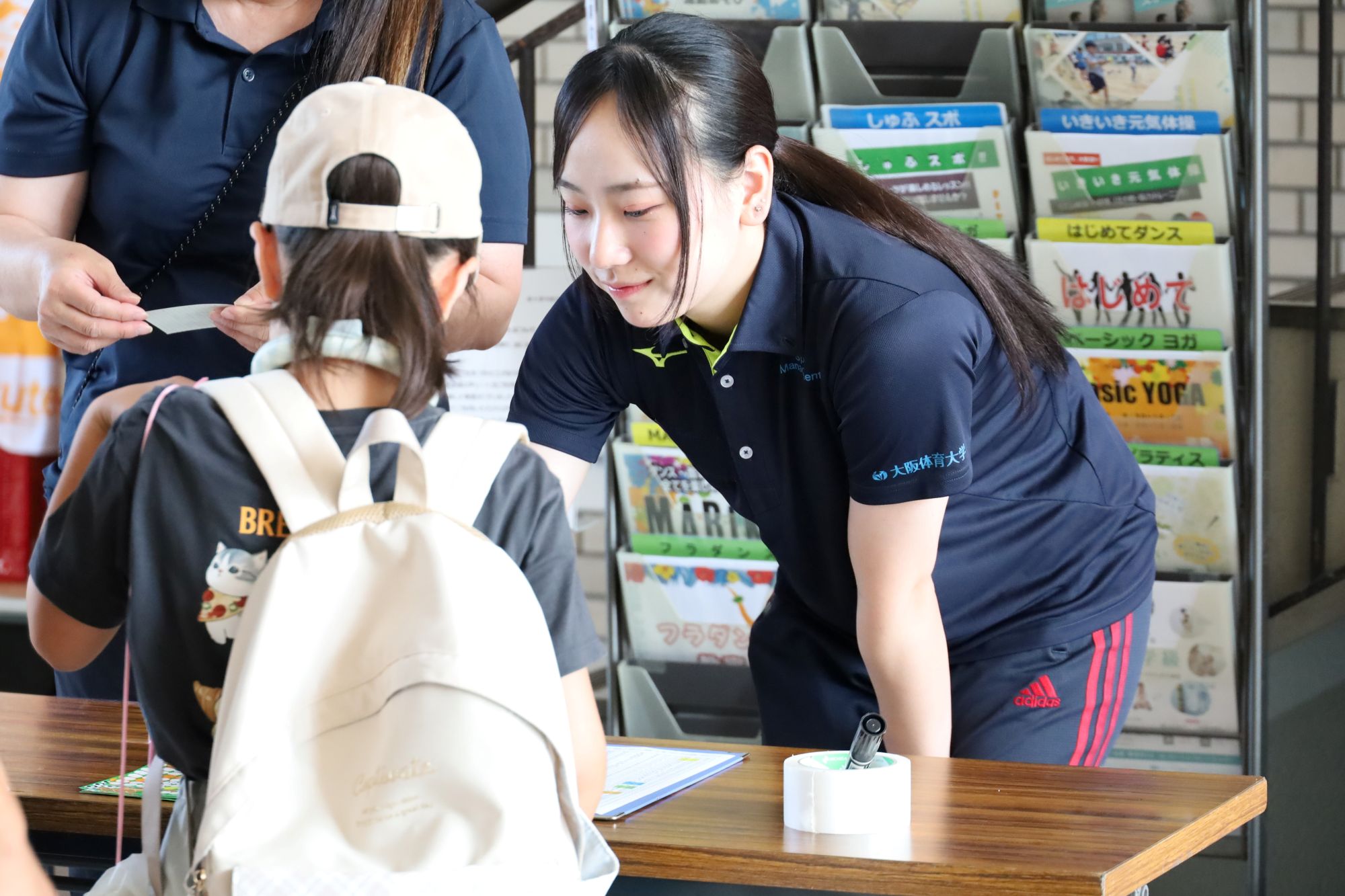 参加者受付 「おはよう!●●ちゃん!」と子どもたちをお出迎え