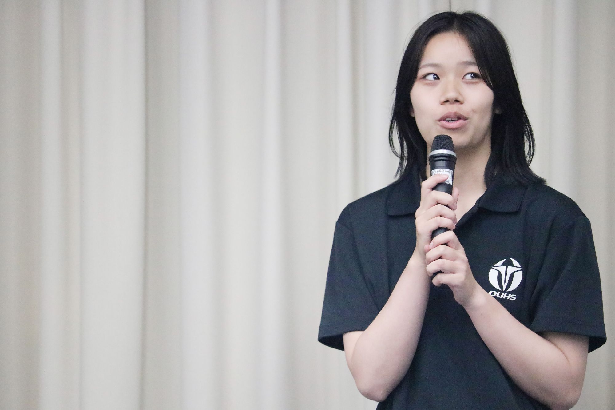 大学生活について話す村上陽菜さん(体育学部4年、大阪・高津高校)